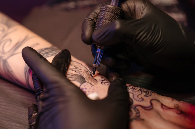 Artist at work on ornamental piece